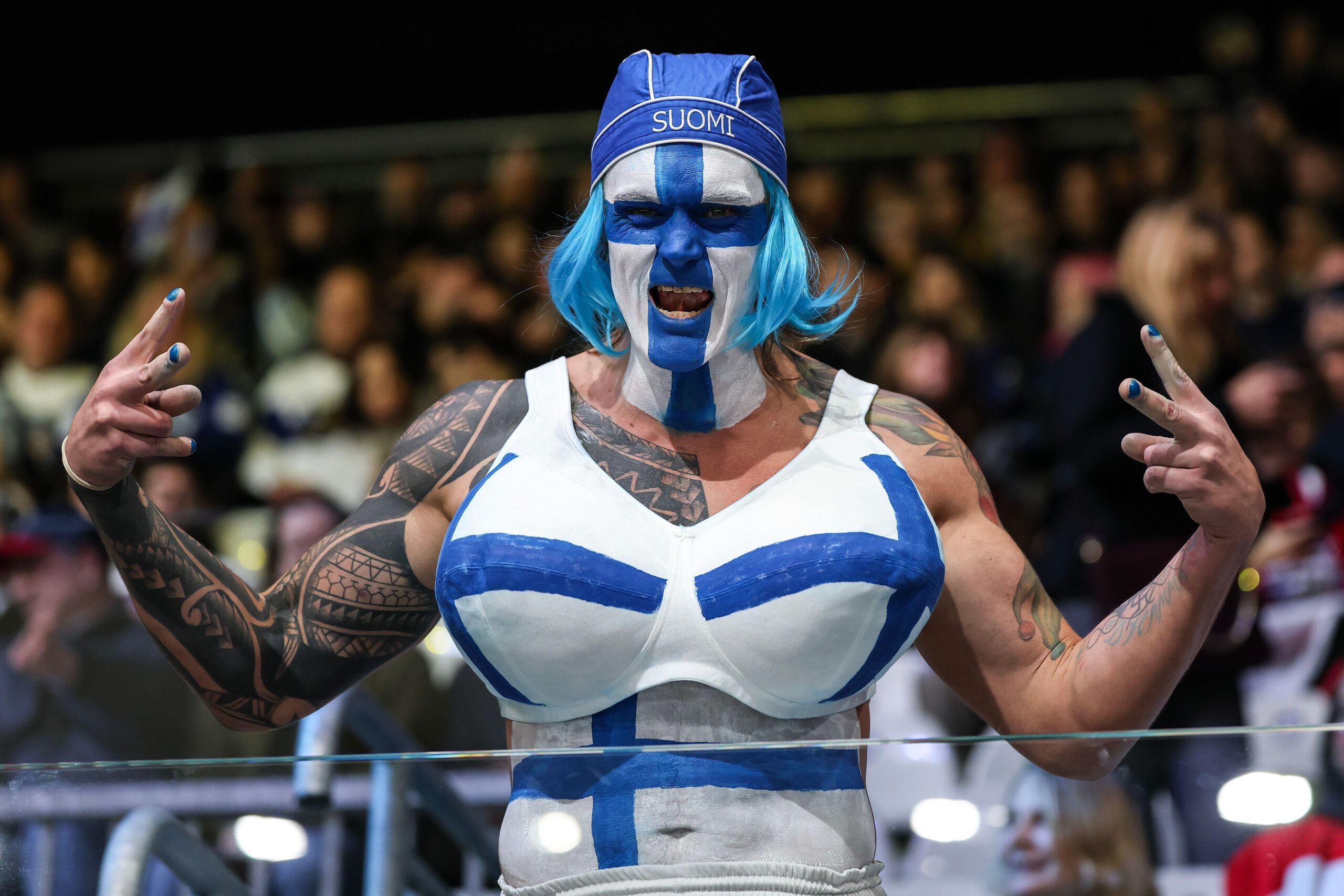 Navijač Finske na hokeja&scaron;koj utakmici Finske i Če&scaron;ke na Zimskim olimpijskim igrama u Italiji