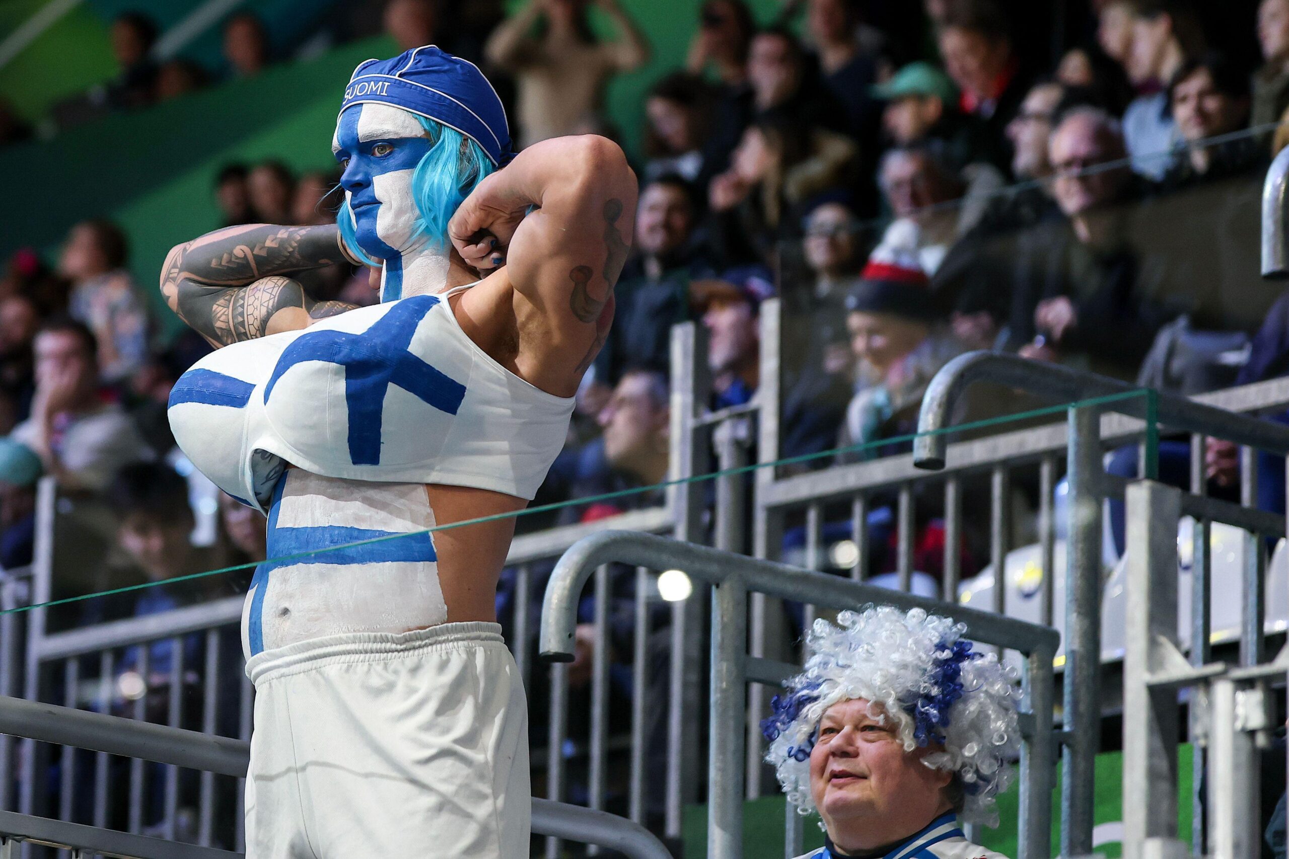 Navijač Finske na hokeja&scaron;koj utakmici Finske i Če&scaron;ke na Zimskim olimpijskim igrama u Italiji