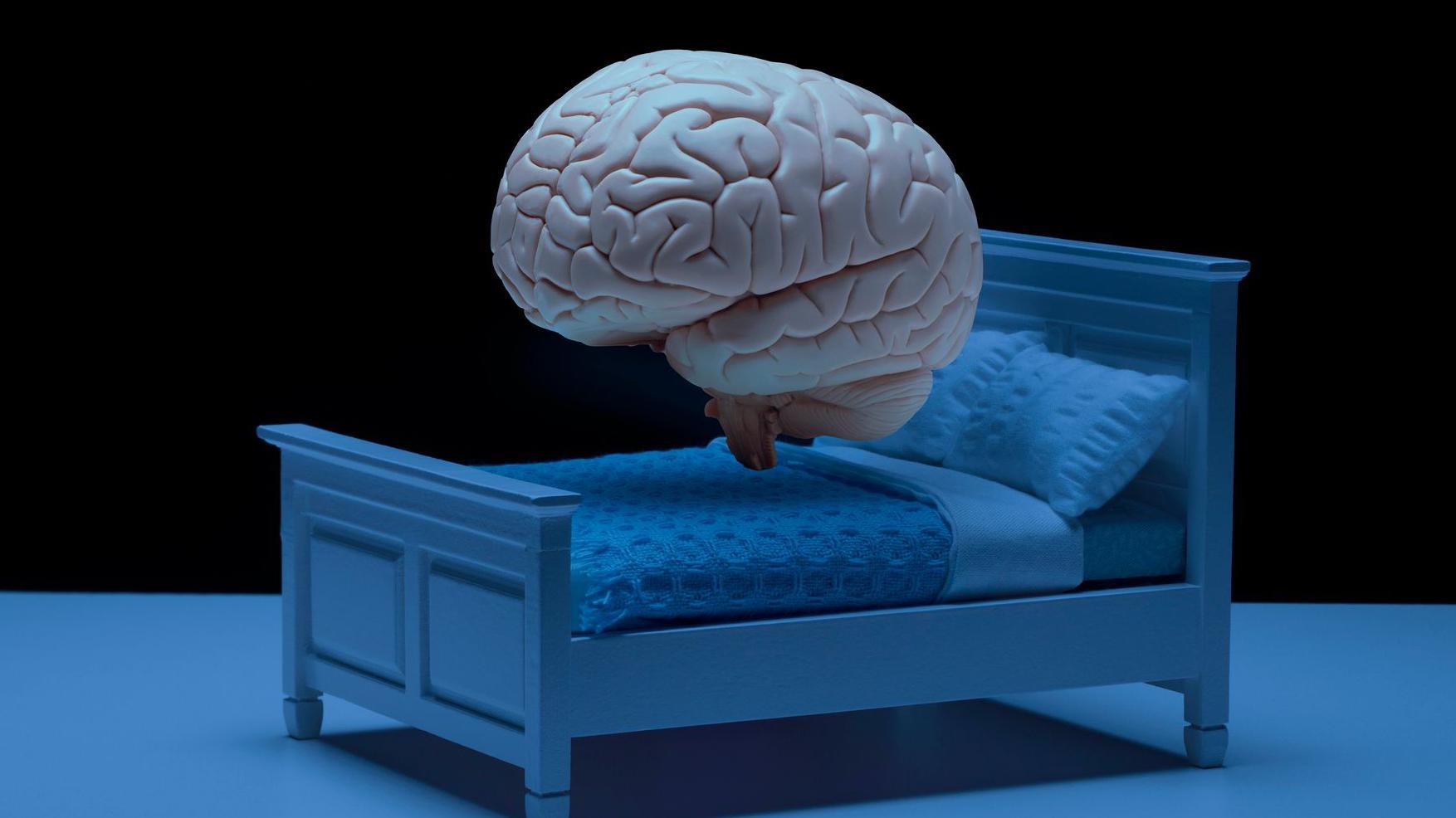 Ilustracija mozga koji lebdi iznad kreveta